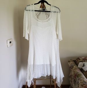 A white swag long sleeve dress